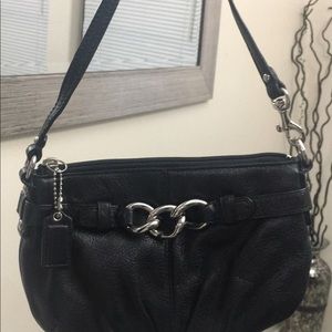 Cute little coach handbag perfect for night out.